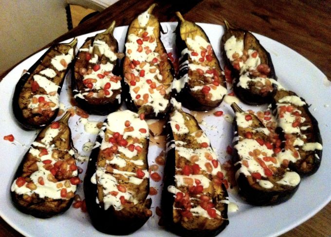 Roasted Eggplant with Buttermilk Sauce and Pomegranate Seeds. 