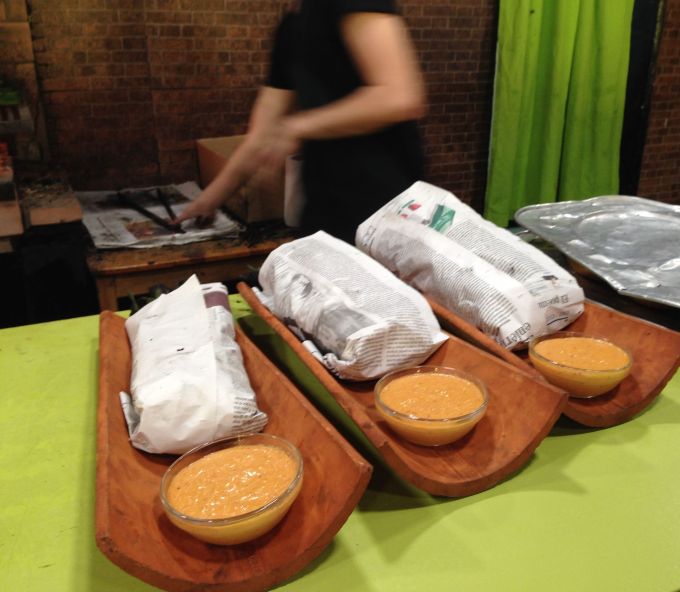 Calcots, wrapped in newspaper, with romesco sauce. 